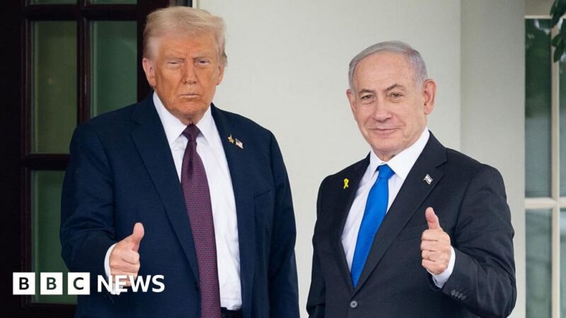 President Trump and Benjamin Netanyahu both look off camera delivering a thumbs up