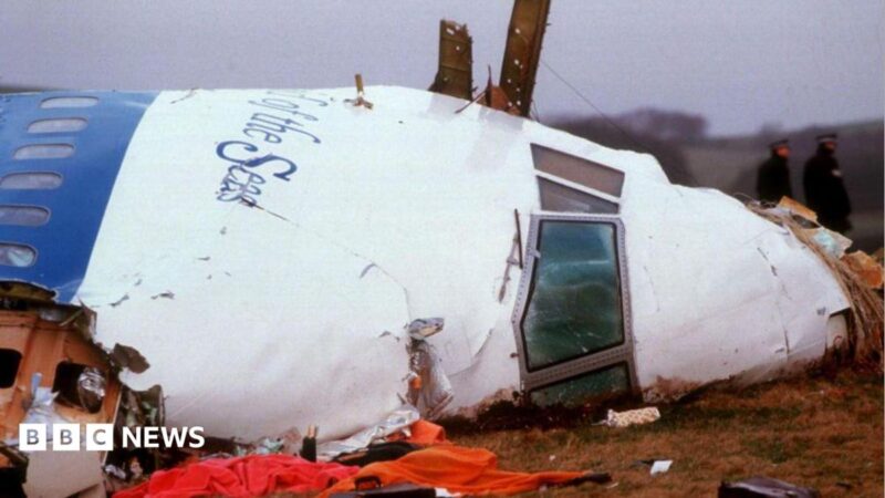 Officials inspect the wreckage of Pan Am flight 103 December 21, 1988 in Lockerbie, Scotland