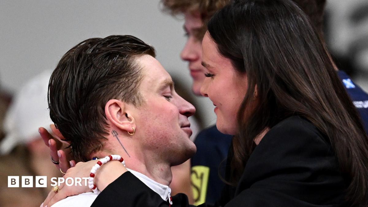 Adam Ramsay-Peaty embraces wife Holly at Tollcross Swimming Centre