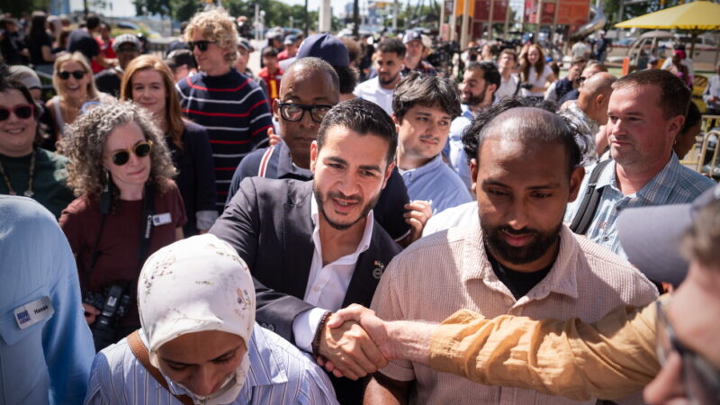 Abdul El-Sayed departs following a news conference at the Spirit of Detroit shortly after winning the Democratic nomination