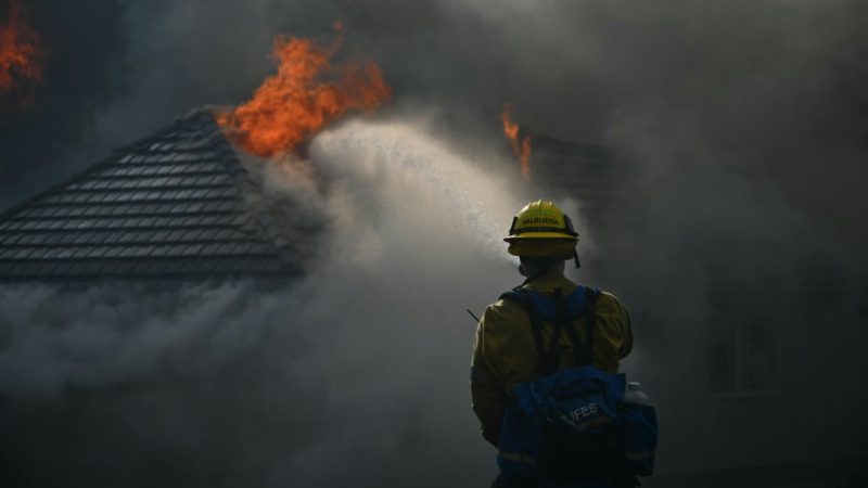 The wind-whipped Norte Fire has quickly burned hundreds of acres San Juan Capistrano, California — Patrick T. Fallon / AFP