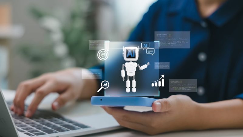 A study examined whether the way AI assistants are presented influences how people treat them in a workplace. Photograph