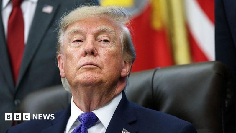 US President Donald Trump listens to a reporters question in the Oval Office at the White House